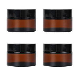 lot 14051 image: ZIYIZE Amber Glass Jars with Lids, 4 Pack 1oz Small Glass Jars with Inner Liners, 30 ml Reusable Empty Round Cosmetic Container for Creams, Lotion, Cosmetic, Spice, Powder