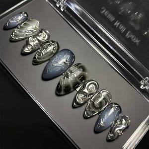 lot 4422 image: 24Pcs Dark Press on Nails Medium Almond Fake Nails with 3D Y2k Irregular Silver Design Pearl Jewelry False Nails Glitter Full Cover Artificial Glue on Nails Gothic Stick on Nail for Women DIY Tips