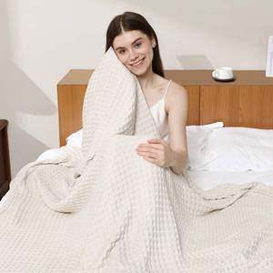 lot 20058 image: Aganear Cooling Blanket for Hot Sleepers,Lightweight Cotton Summer Blanket of Rayon Derived from Bamboo.Waffle Weave Luxury Throws for Bed,Couch and Sofa.Beige,66x90 Inches