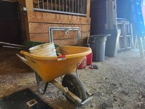 lot 18735 image: True Temper Wheelbarrow and Farm Supplies Collection