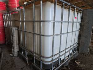 lot 18768 image: IBC Water Tank with Metal Cage Frame 275 gallon