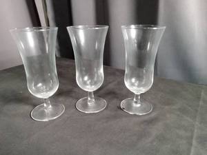 lot 40993 image: Clear Glass Hurricane Cocktail Glasses Set of 3