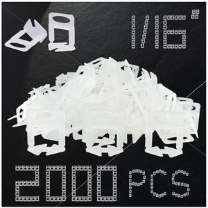 lot 16707 image: Tile Leveling System Clips 116 Inch 2000pcs Tile Leveling Spacer DIY Tiles Leveler Spacers 1.5mm Tile Tools Set Tile Leveling System for Professional Ceramic Stone Installation. COUNT UNKNOWN. - Retail $34