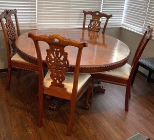 lot 150 image: Dining table with 4 ornate chairs 30 x 55 x 55 in