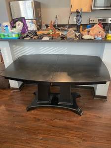 lot 153 image: Black table 29 x 54 x 34 in