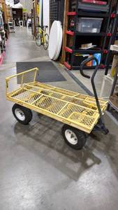 lot 217 image: Yellow metal wagon with drop or removable sides