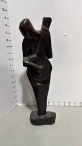 lot 1004 image: Hand-carved wooden sculpture of a musician approx 14 inches tall