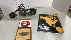lot 1009 image: Motorcycle scrap metal sculpture, Harley Davidson mini plate and touring book