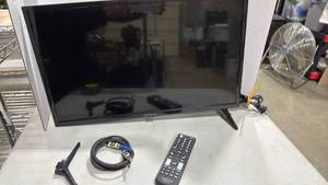 lot 1024 image: Insignia 24 inch TV with remote (one leg needs repaired)