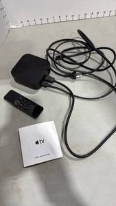 lot 1031 image: Apple TV with remote