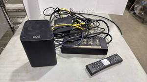 lot 1039 image: Cox WiFi , remote and Newport power strip