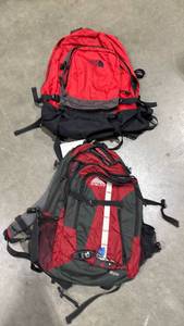 lot 1081 image: North Face and Kielty backpacks