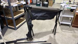 lot 1217 image: Portable folding cot in bag