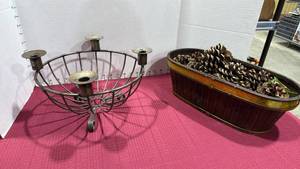 lot 2039 image: Wrought iron bowlcandle holder and basket with pinecones