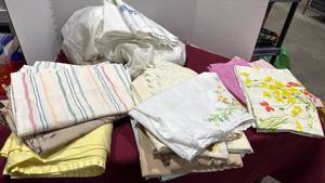 lot 2054 image: Pillow cases and flat sheets