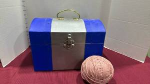 lot 2057 image: Cardboard treasure chest with yarn