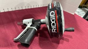 lot 2073 image: Rigid drain cleaner appears new