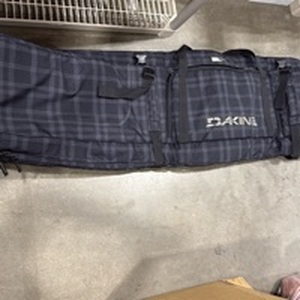 lot 2076 image: Dakine snowboard bag with wheels