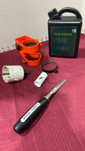 lot 2077 image: Door lock installation template guide, hole saw, chisel and fog juice