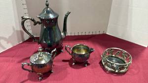 lot 2127 image: Silver plate coffee pot with creamer & sugar and candle holder