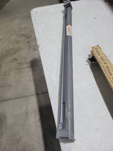 lot 1036 image: Gray retractable gate 71 W x 41 T
