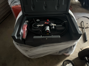 lot 304 image: Fuel tank with pump