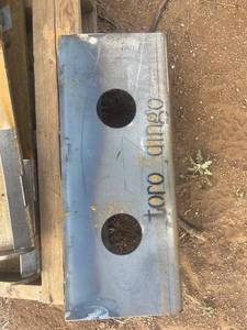 lot 497 image: Toro dingo skid steer mounting plate