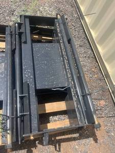 lot 556 image: JCT Attachments Skid Steer Quick Attach bale spear