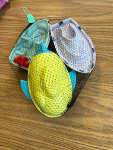 lot 138 image: Mesh bag with 37 inch boat float floats