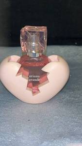 lot 56 image: Ariana Grande Heart-Shaped Perfume  78 full