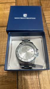 lot 62 image: Brand new never worn with tags Montres Prestige by Invicta  Stainless Steel Watch with Original Box
