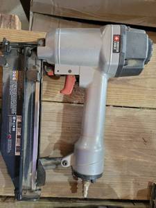 lot 20589 image: Porter Cable Pneumatic Nail Gun Air Tool - Retail $45