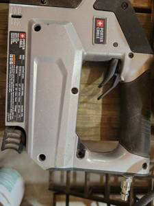 lot 20590 image: Porter Cable Pneumatic Staple Gun - Retail $45
