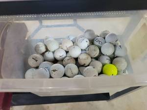 lot 20615 image: Mixed Brand Golf Balls Collection in Storage Container - Retail $25