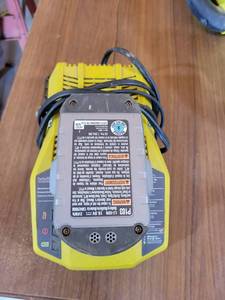 lot 20753 image: Ryobi 18V Lithium Ion Battery Charger with Battery - Retail $35
