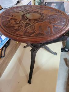 lot 20762 image: Carved Wood Round Side Table with base damaged on leg. See photo - Retail $75