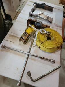 lot 20793 image: Trailer Hitch Kit with Ratchet Strap and Tools - Retail $45