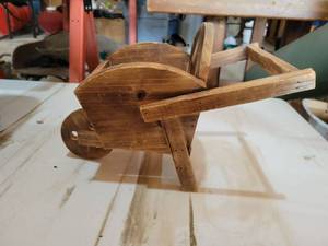 lot 20809 image: Handmade Wooden wheel barrel  - Retail $75