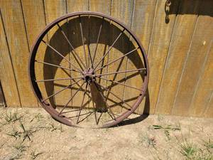 lot 20871 image: Old Wooden Wagon Wheel with Metal Rim 46in across - Retail $75