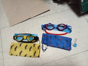 lot 42372 image: Kids Swimming Goggles with Storage Pouches Set - Retail $15