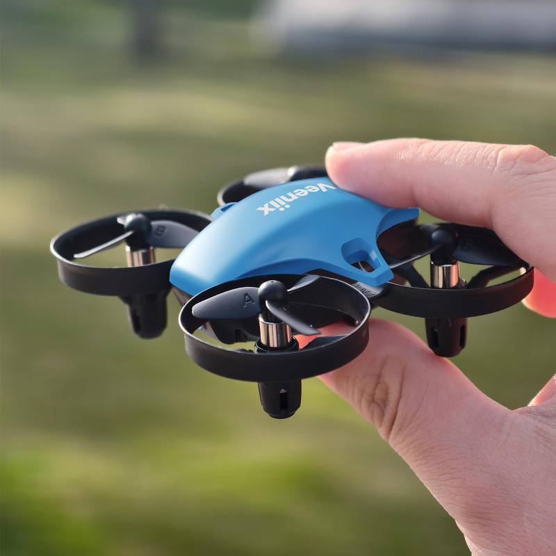 lot 45052 image: Veeniix V995 Mini Drones for Kids 14 and Beginners,Indoor RC Quadcopter,Small Helicopter Plane with 3D Flips,360° Rotation,Circle Fly,Auto Hover,Headless Mode and 3 Batteries,Gift for Boys and Girls - Retail $34