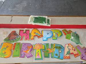lot 692 image: Happy Birthday Dinosaur Decoration, Green Foil Fringe Curtain  - Retail $0