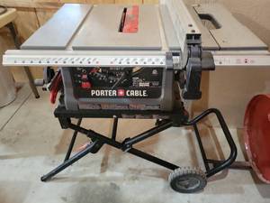 lot 2 image: Porter Cable 10 Inch Jobsite Table Saw with Stand missing handle see photos - Retail $250