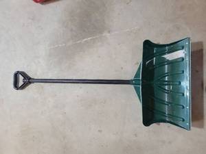 lot 12 image: Green Plastic Snow Shovel with Black Handle