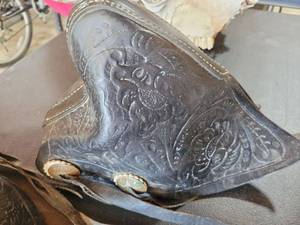 lot 37 image: These are leather western saddle stirrup covers known as tapaderos