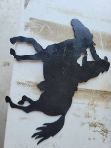 lot 99 image: Cowboy riding a horse Silhouette Wall Art