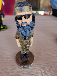 lot 141 image: Phil Robertson Duck Dynasty Bobblehead Figure