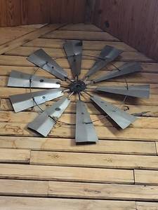 lot 251 image: Metal Windmill Wall Decor 48.5in