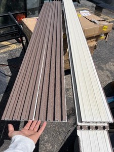 lot 109 image: Bundle of 8 Pieces of WPC FLUTED SLAT WALL PANEL - Light Brown - PVC Weather Proof Great for indoor or Outdoor 8 x 5