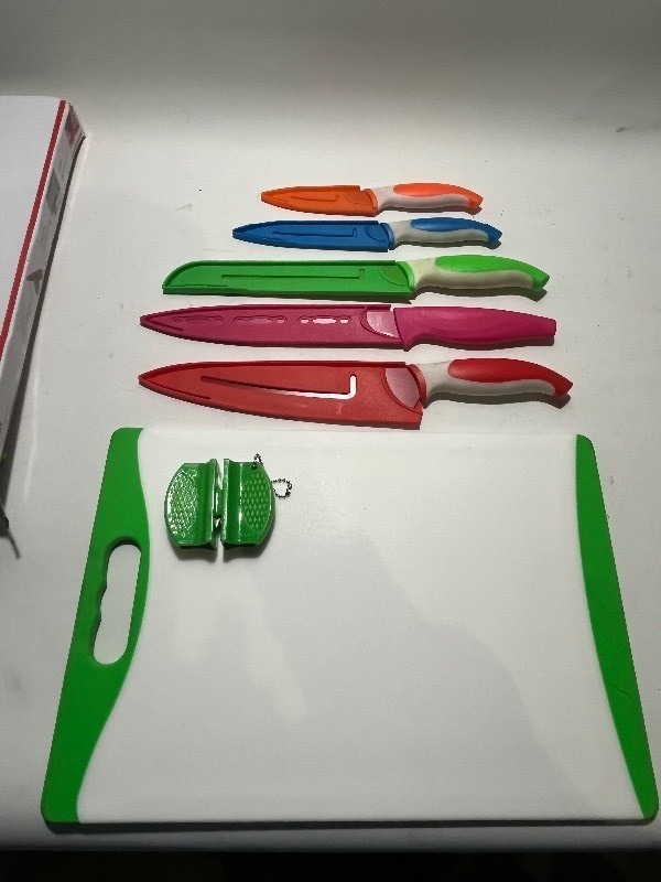 lot 656 image: EatNeat 12-Piece Knife and Cutting Board Set